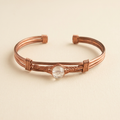 Pulsera de doble aro de cobre con fondo suave